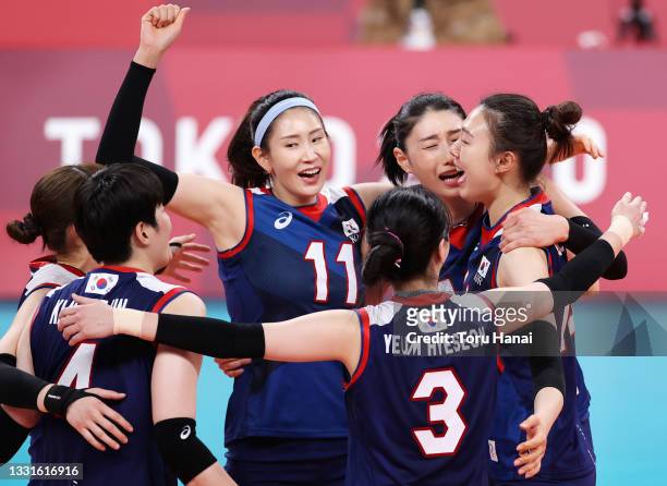 Su Ji Kim of Team South Korea reacts with team mates against Team Japan during the Women's Preliminary - Pool A volleyball on day eight of the Tokyo...