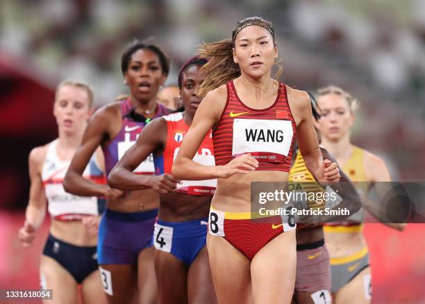 Chunyu Wang of Team China leads her Women's 800m Semi-Final field on day eight of the Tokyo 2020 Olympic Games at Olympic Stadium on July 31, 2021 in...