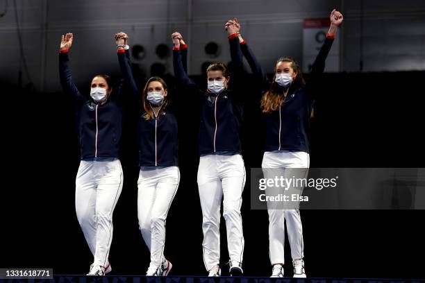 Silver medalists Team France pose on the podium during the medal ceremony for the Women's Sabre Team Fencing on day eight of the Tokyo 2020 Olympic...