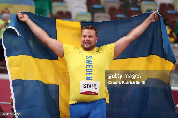 Daniel Stahl of Team Sweden celebrates after winning the gold medal in the Men's Discus Throw Final on day eight of the Tokyo 2020 Olympic Games at...