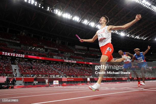 Kajetan Duszynski of Team Poland celebrates after crossing the finishing line to win gold in the 4 x 400m Mixed Relay Final on day eight of the Tokyo...