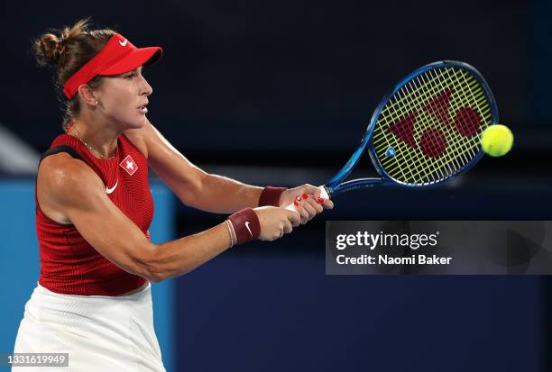 Belinda Bencic of Team Switzerland plays a backhand during her Women's Singles Gold Medal match against Marketa Vondrousova of Team Czech Republicon...