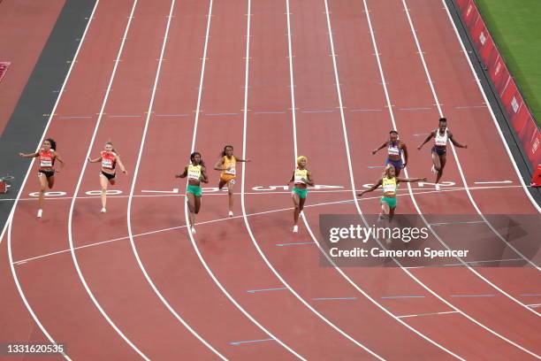 Elaine Thompson-Herah of Team Jamaica wins the Women's 100m Final on day eight of the Tokyo 2020 Olympic Games at Olympic Stadium on July 31, 2021 in...