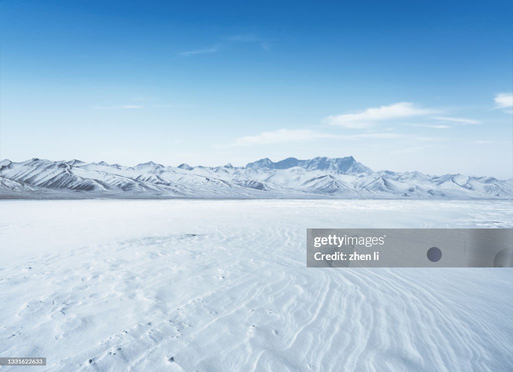 Snowcapped mountain and flat snowfield