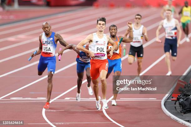 Kajetan Duszynski of Poland celebrates as he anchors Poland to the gold medal in the 4 x 400m mixed Relay on day eight of the Tokyo 2020 Olympic...