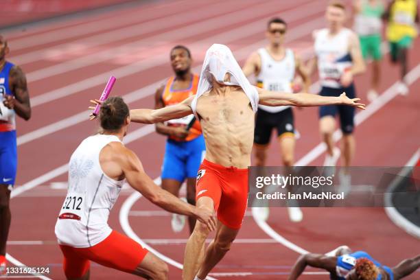 Kajetan Duszynski of Poland celebrates as he anchors Poland to the gold medal in the 4 x 400m mixed Relay on day eight of the Tokyo 2020 Olympic...