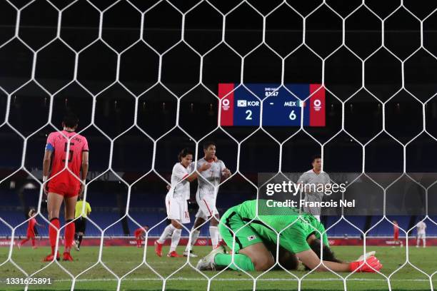 Bumkeun Song of Team South Korea looks dejected after the Team Mexico sixth goal scored by Eduardo Aguirre during the Men's Quarter Final match...
