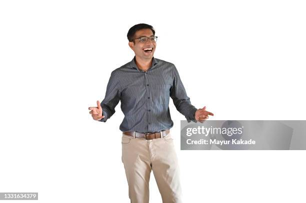 portrait of a mid age man in formal wear laughing against white background laughing and talking - asian and indian ethnicities imagens e fotografias de stock