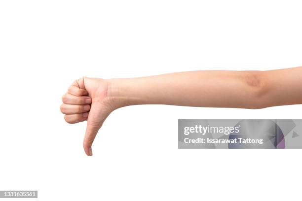 hand thumb down isolated on the left side on white background. rejection symbol - refusing stock pictures, royalty-free photos & images