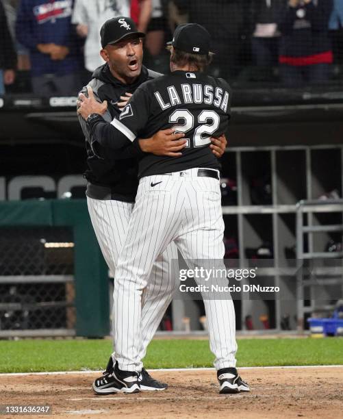 Manager Tony La Russa of the Chicago White Sox is held back by bench coach Miguel Cairo during the eighth inning at Guaranteed Rate Field on July 30,...