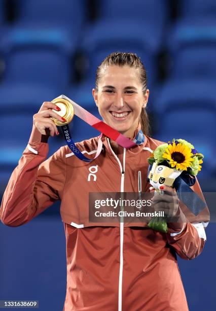 Belinda Bencic of Team Switzerland smiles with her gold medal during the medal ceremony after defeating Marketa Vondrousova of Team Czech Republic in...