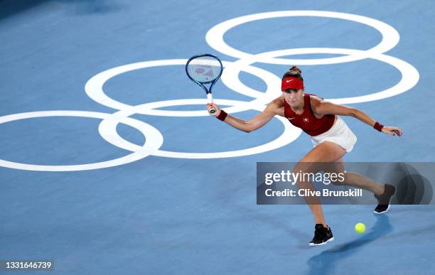 Belinda Bencic of Team Switzerland plays a forehand during her Women's Singles Gold Medal match against Marketa Vondrousova of Team Czech Republic on...