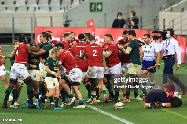 Players clash following a tackle from Cheslin Kolbe of South Africa Springboks on Conor Murray of British & Irish Lions during the 2nd Test between...