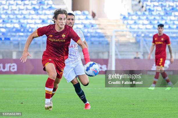 Edoardo Bove of AS Roma in action during a Pre-Season Friendly match between Sevilla FC and AS Roma at Estadio Algarve on July 31, 2021 in Faro,...