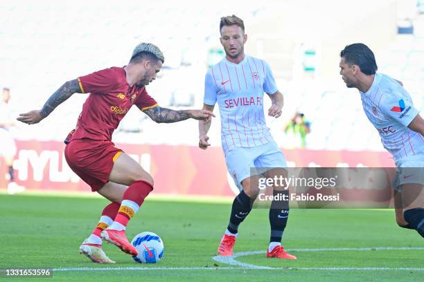 Carles Perez of AS Roma in action during a Pre-Season Friendly match between Sevilla FC and AS Roma at Estadio Algarve on July 31, 2021 in Faro,...