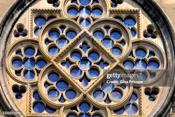 the rose window of the cathedral of notre dame in lausanne, switzerland. - lausanne cathedral notre dame stock pictures, royalty-free photos & images