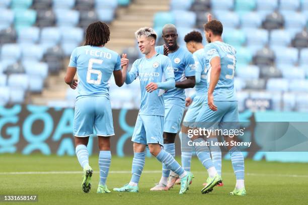 Ben Knight of Manchester City celebrates with Nathan Ake and team mates after scoring their side's second goal during the Pre-Season Friendly match...