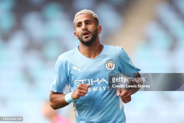 Riyad Mahrez of Manchester City celebrates after scoring their side's third goal during the Pre-Season Friendly match between Manchester City and...