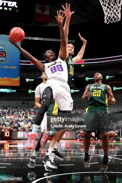 Mike Taylor of the Ghost Ballers attempts a shot while being guarded by Spencer Hawes of the Ball Hogs during BIG3 - Week Four at the American...