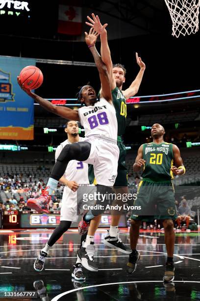 Mike Taylor of the Ghost Ballers attempts a shot while being guarded by Spencer Hawes of the Ball Hogs during BIG3 - Week Four at the American...