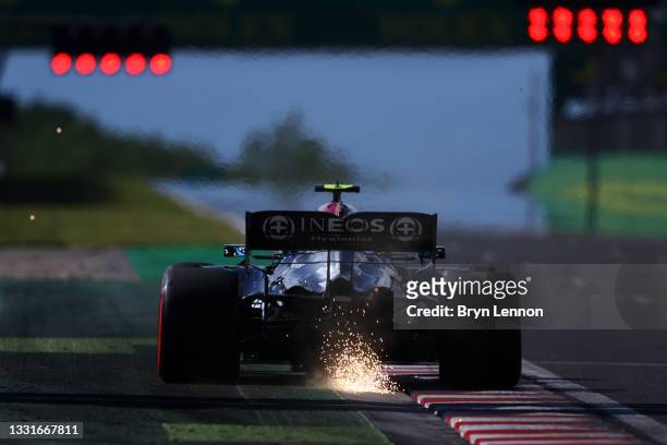 Lewis Hamilton of Great Britain driving the Mercedes AMG Petronas F1 Team Mercedes W12 during qualifying ahead of the F1 Grand Prix of Hungary at...