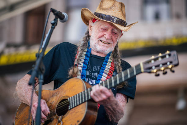 Musician Willie Nelson performs during the Georgetown to Austin March for Democracy rally on July 31, 2021 in Austin, Texas. Texas activists and...