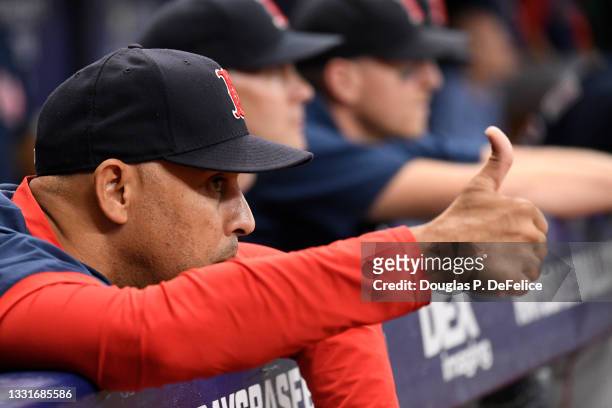 Manager Alex Cora of the Boston Red Sox reacts during the first inning against the Tampa Bay Rays at Tropicana Field on July 31, 2021 in St...