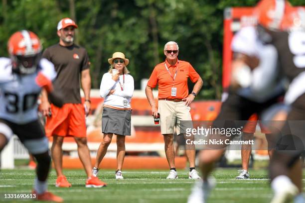 Team owners Dee and Jimmy Haslam of the Cleveland Browns watch practice during Cleveland Browns Training Camp on July 31, 2021 in Berea, Ohio.
