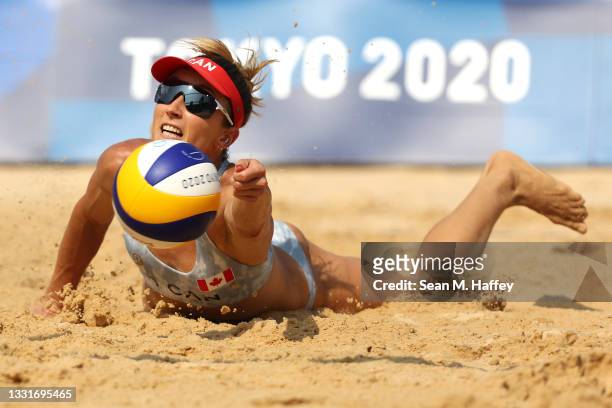 Heather Bansley of Team Canada dives for the ball against Team United States during the Women's Round of 16 beach volleyball on day nine of the Tokyo...