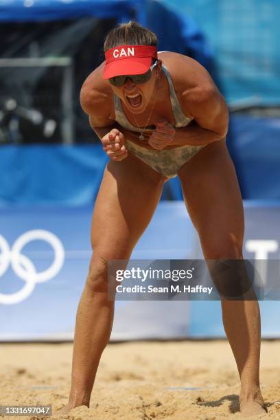 Heather Bansley of Team Canada celebrates after a play against Team United States during the Women's Round of 16 beach volleyball on day nine of the...