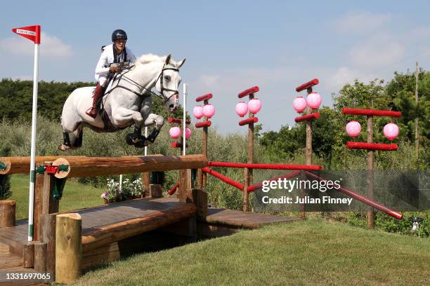 Colleen Loach of Team Canada riding Qorry Blue D'Argouges clears a jump during the Eventing Cross Country Team and Individual on day nine of the...