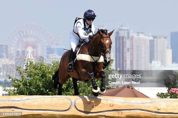 Laura Collett of Team Great Britain riding London 52 clears a jump during the Eventing Cross Country Team and Individual on day nine of the Tokyo...