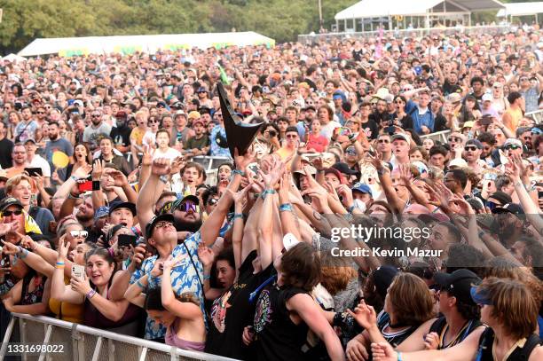 Crowd catches Wes Borland's guitar during Lollapalooza 2021 at Grant Park on July 31, 2021 in Chicago, Illinois.