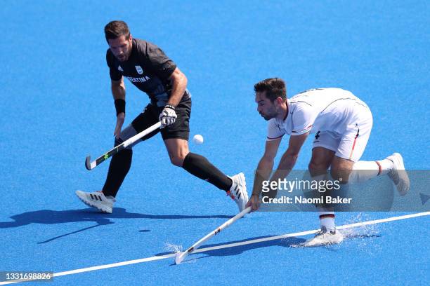 Lukas Windfeder of Team Germany chases the loose ball against Agustin Alejandro Mazzilli of Team Argentina during the Men's Quarterfinal match...