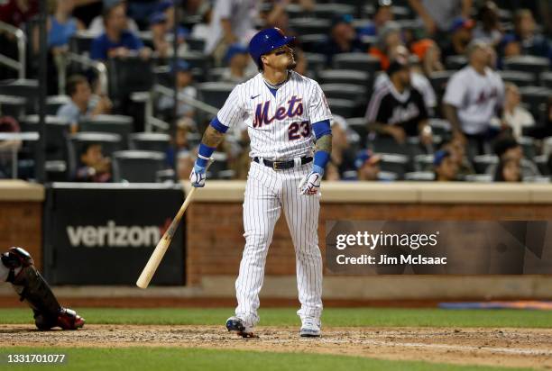 Javier Baez of the New York Mets watches the flight of his sixth inning two run home run against the Cincinnati Reds at Citi Field on July 31, 2021...