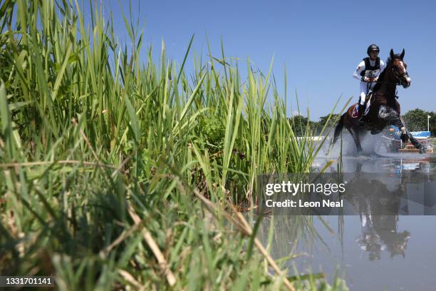 Robin Godel of Team Switzerland riding Jet Set competes during the Eventing Cross Country Team and Individual on day nine of the Tokyo 2020 Olympic...