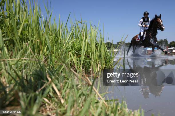 Robin Godel of Team Switzerland riding Jet Set competes during the Eventing Cross Country Team and Individual on day nine of the Tokyo 2020 Olympic...