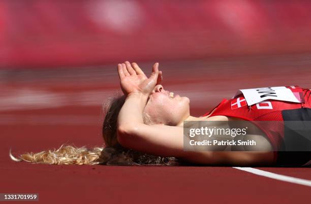 Anna Emilie Moller of Team Denmark reacts after competing in round one of the Women's 3000m Steeplechase heats on day nine of the Tokyo 2020 Olympic...