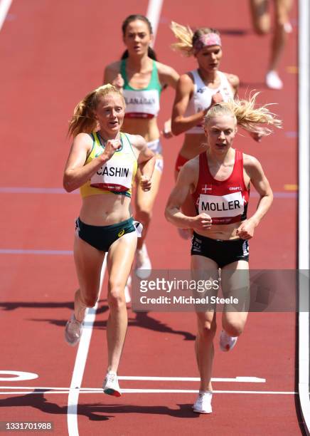 Amy Cashin of Team Australia and Anna Emilie Moller of Team Denmark compete in round one of the Women's 3000m Steeplechase heats on day nine of the...