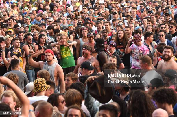 Crowd catches Wes Borland's guitar during Lollapalooza 2021 at Grant Park on July 31, 2021 in Chicago, Illinois.