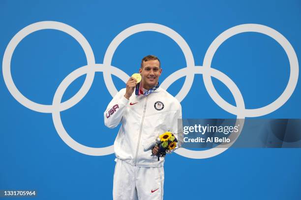 Gold medalist Caeleb Dressel of Team United States poses with the gold medal for the Men's 50m Freestyle Final on day nine of the Tokyo 2020 Olympic...
