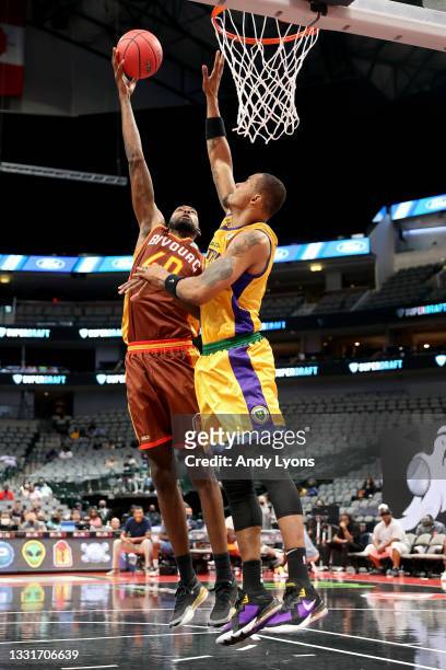 Mickell Gladness of the Bivouac attempts a shot while being guarded by Rashard Lewis of the 3 Headed Monsters during BIG3 - Week Four at the American...
