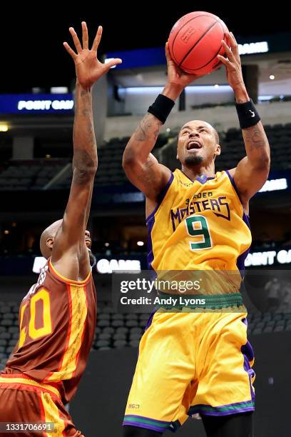 Rashard Lewis of the 3 Headed Monsters attempts a shot while being guarded by Mickell Gladness of the Bivouac during BIG3 - Week Four at the American...