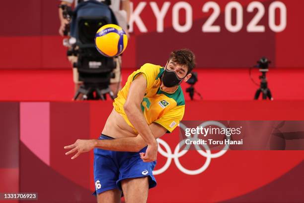 Lucas Saatkamp of Team Brazil serves against Team France during the Men's Preliminary Round - Pool B volleyball on day nine of the Tokyo 2020 Olympic...