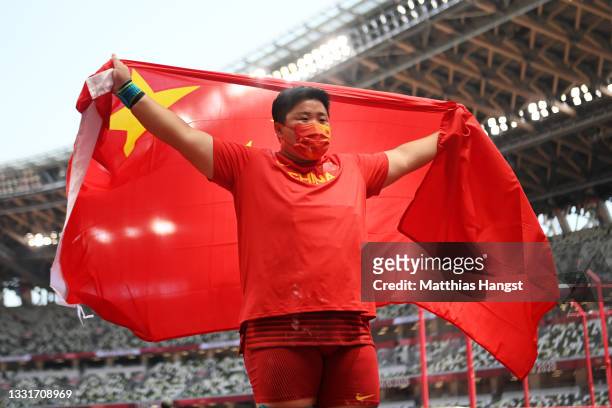 Lijiao Gong of Team China reacts after winning the gold medal in the Women's Shot Put Final on day nine of the Tokyo 2020 Olympic Games at Olympic...