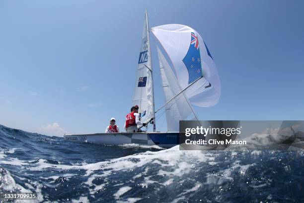 Paul Snow-Hansen and Dan Willcox of Team New Zealand of Team Australia head out to compete in the Men's 470 class on day nine of the Tokyo 2020...