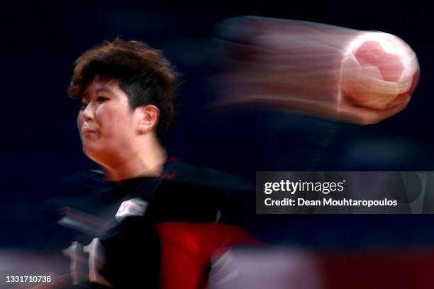 Ryu Eun Hee of Team South Korea passes the ball during the Women's Preliminary Round Group A handball match between Montenegro and South Korea on day...