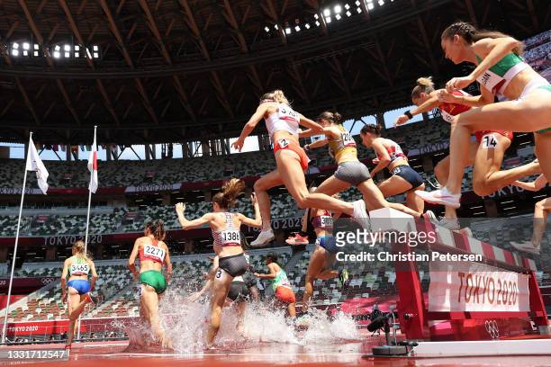 Runners compete in round one of the Women's 3000m Steeplechase heats on day nine of the Tokyo 2020 Olympic Games at Olympic Stadium on August 01,...