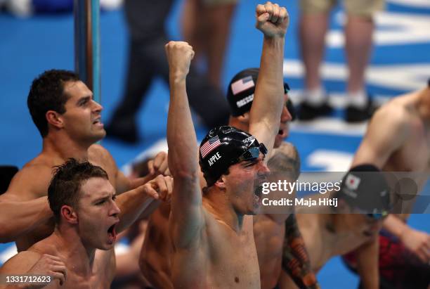 Zach Apple and teammates of United States react after winning the gold medal and breaking the world record in the Men's 4 x 100m Medley Relay Final...