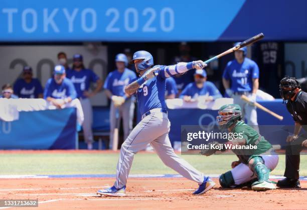 Nick Rickles of Team Israel hits an RBI single to left field against Team Mexico in the first inning during round one of baseball team competition on...